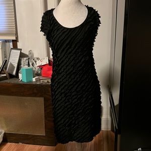 Katie’s medium black frilly bodycon dress